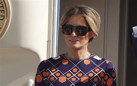 Melania Trump Arrives in Florida Wearing Vibrant Gucci Dress .